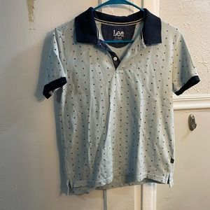 Blue polo shirt with triangles